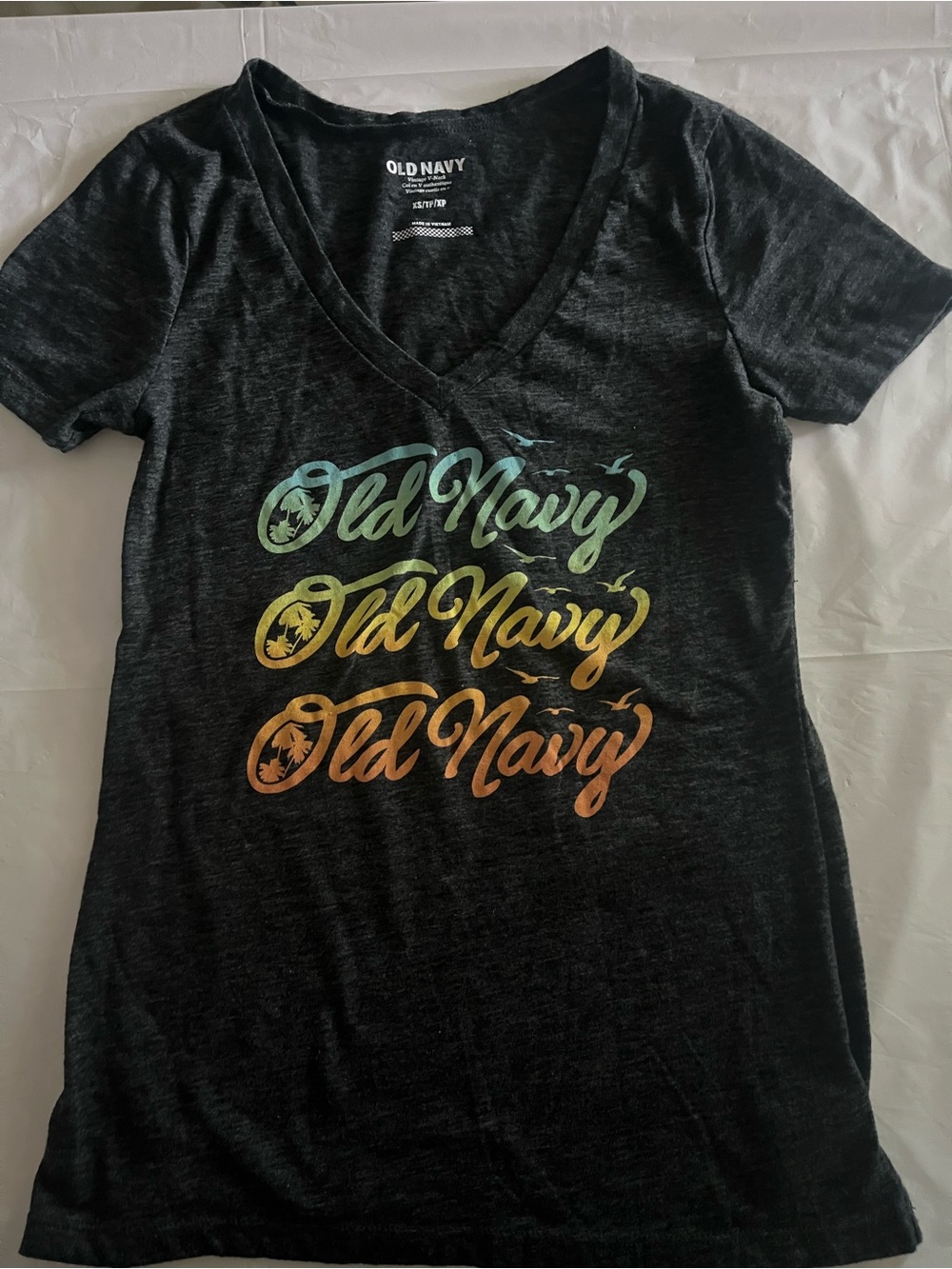Old Navy Black V-Neck Tee with Teal, Yellow and Orange Logo